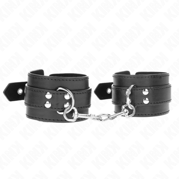 Imagen del artículo erótico KINK - MUÑEQUERAS CON TACHUELAS NEGRO 35 X 6 CM de KINK WRIST RESTRAINT en la sección BDSM & BONDAGE |Bondage|Esposas de fijación de Millenial Sexshop.