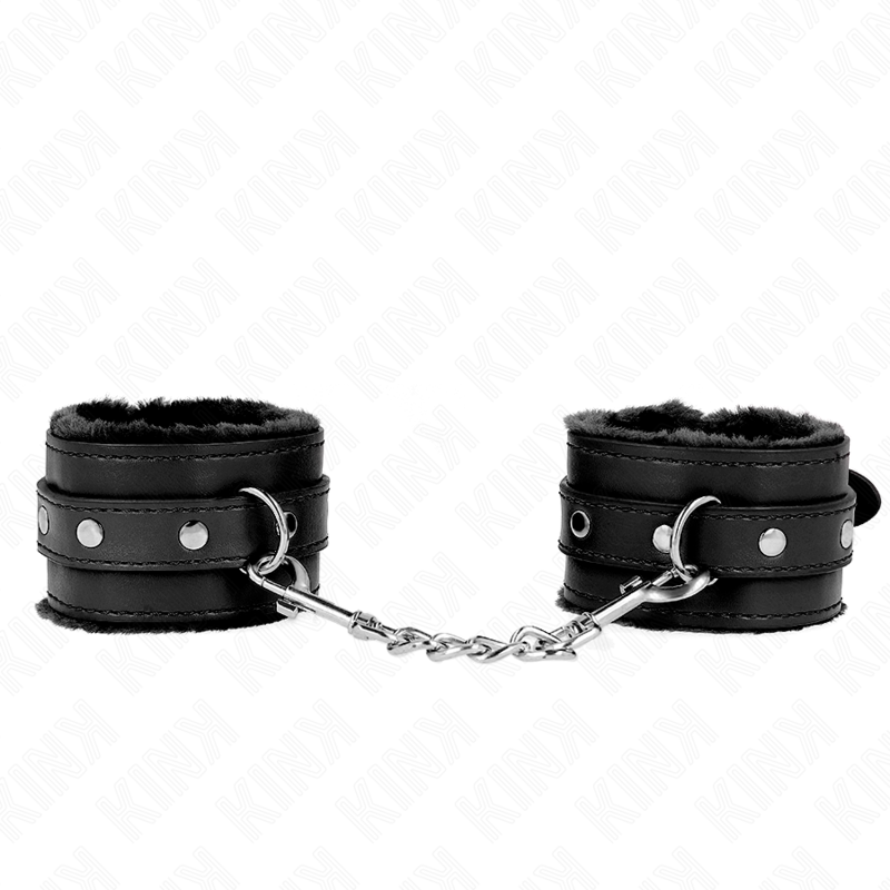 Imagen del artículo erótico KINK - MUÑEQUERAS FORRADAS PREMIUM NEGRO CON CORREA NEGRO AJUSTABLE 17-29 CM X 6 CM de KINK WRIST RESTRAINT en la sección BDSM & BONDAGE |Bondage|Esposas de fijación de Millenial Sexshop.