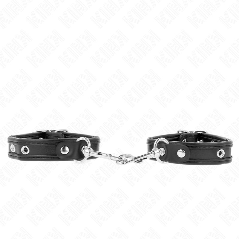 Imagen del artículo erótico KINK - MUÑEQUERAS MINI NEGRO CON TACHUELAS AJUSTABLE 16-22 CM X 2 CM de KINK WRIST RESTRAINT en la sección BDSM & BONDAGE |Bondage|Esposas de fijación de Millenial Sexshop.