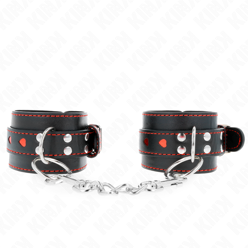 Imagen del artículo erótico KINK - MUÑEQUERAS NEGRO CON INCRUSTACIÓN DE CORAZÓN ROJO AJUSTABLE 21-28 CM X 5.5 CM de KINK WRIST RESTRAINT en la sección BDSM & BONDAGE |Bondage|Esposas de fijación de Millenial Sexshop.