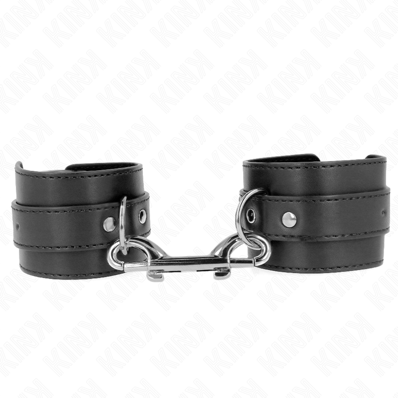 Imagen del artículo erótico KINK - MUÑEQUERAS SIMPLES CON FILA DE REMACHES Y HEBILLA GRANDE NEGRO AJUSTABLE 17-28 CM X 5 CM de KINK WRIST RESTRAINT en la sección BDSM & BONDAGE |Bondage|Esposas de fijación de Millenial Sexshop.