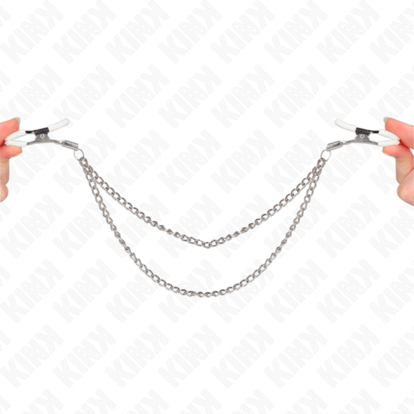 Imagen del artículo erótico KINK - PINZAS PARA PEZONES CON DOBLE CADENA FINA PLATEADO 20/23 CM de KINK NIPPLE GRIP en la sección BDSM & BONDAGE |Artículos BDSM|Pinzas Pezones BDSM de Millenial Sexshop.
